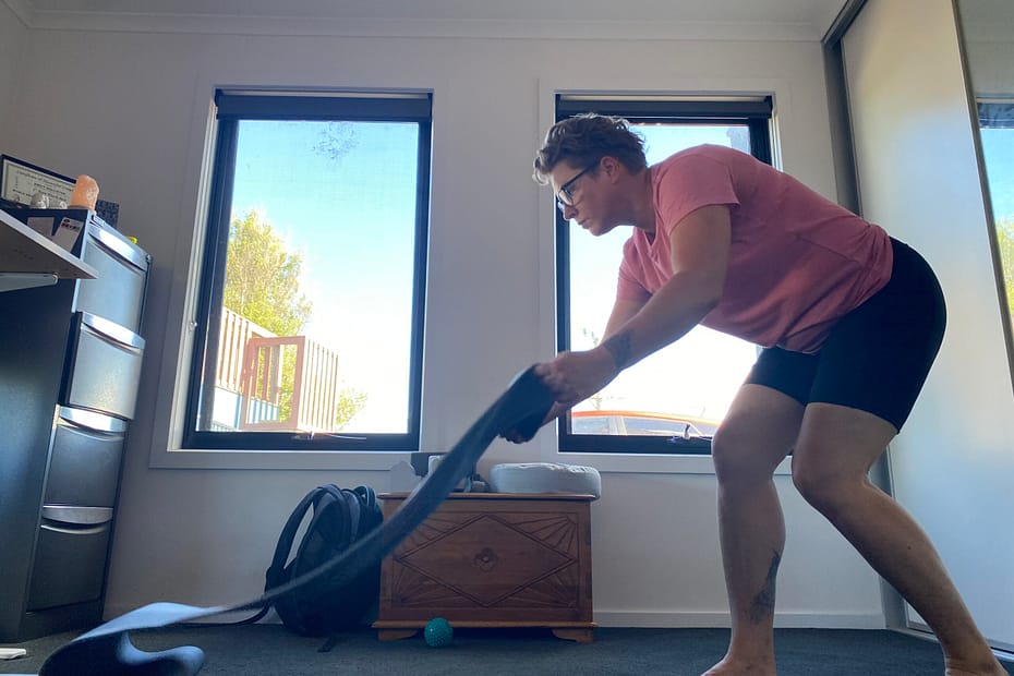 Em lays out her yoga mat